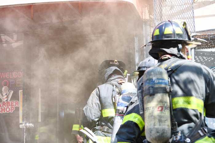 firefighters in brownsville building